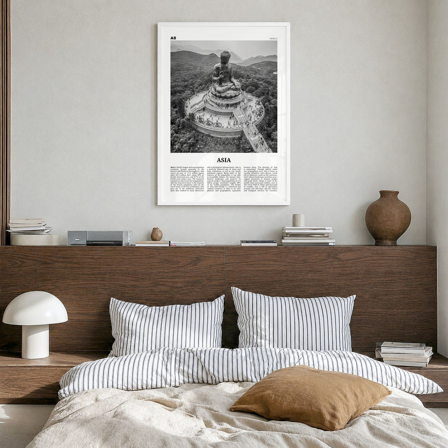 Asia Newspaper Poster in a white wood frame, hanging in a bedroom