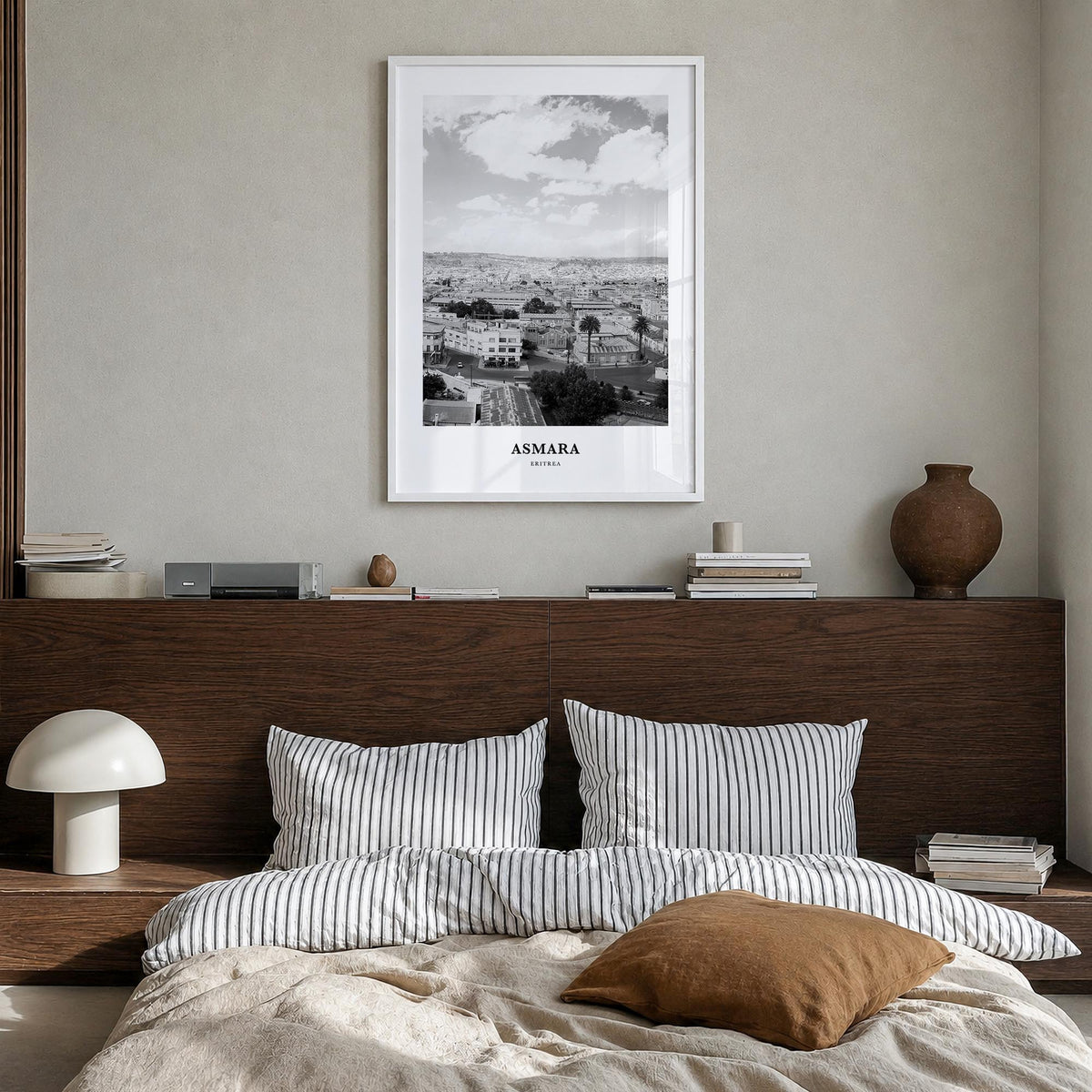 Asmara black & white classic poster of Eritrea – vertical wall art in white wood frame, hanging on wall