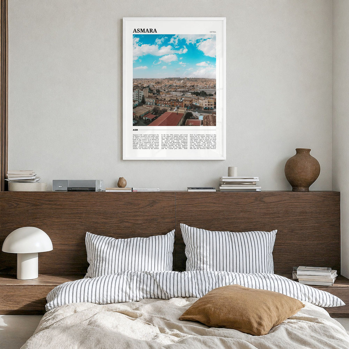 Asmara Travel No 1 Poster in a white wood frame, hanging in a bedroom