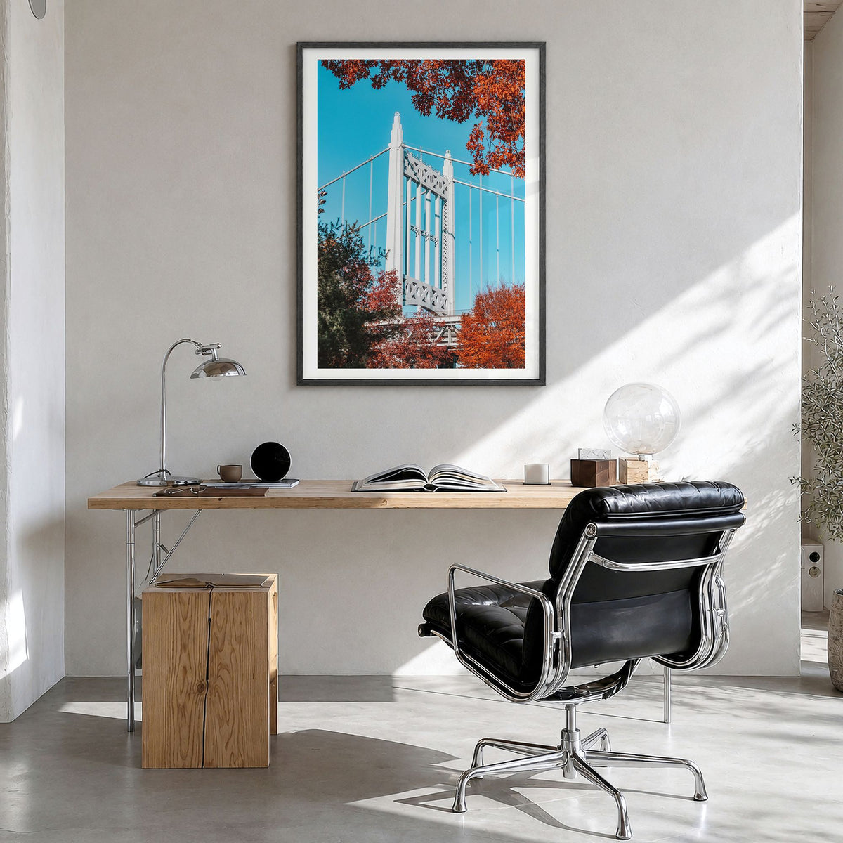 Astoria, New York Photo Poster in a black wood frame, hanging in a bright home office, white border