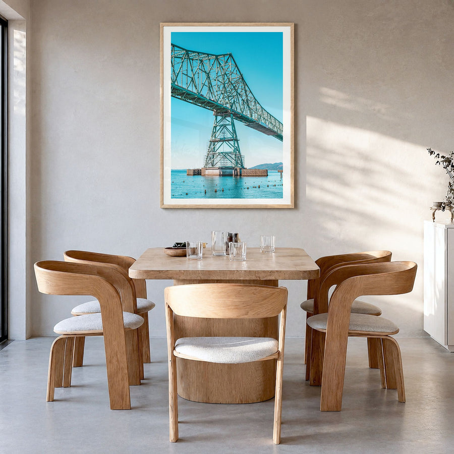Astoria, Oregon Photo No 2 Poster in a natural wood frame, hanging in a dining room, white border
