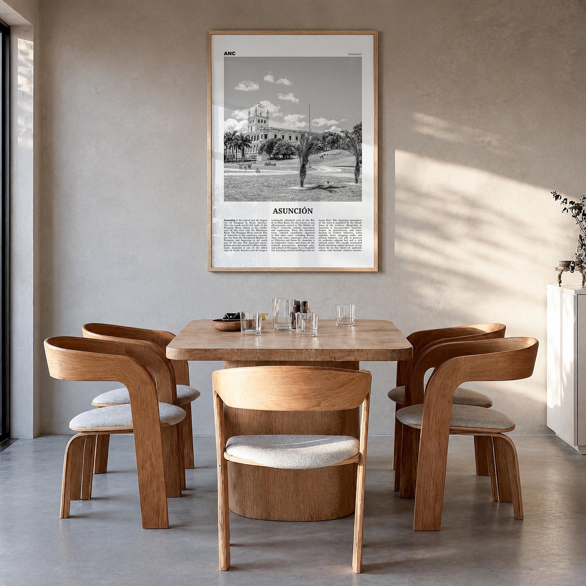 Asunción black & white newspaper poster of Paraguay – vertical wall art in natural wood frame, hanging on wall
