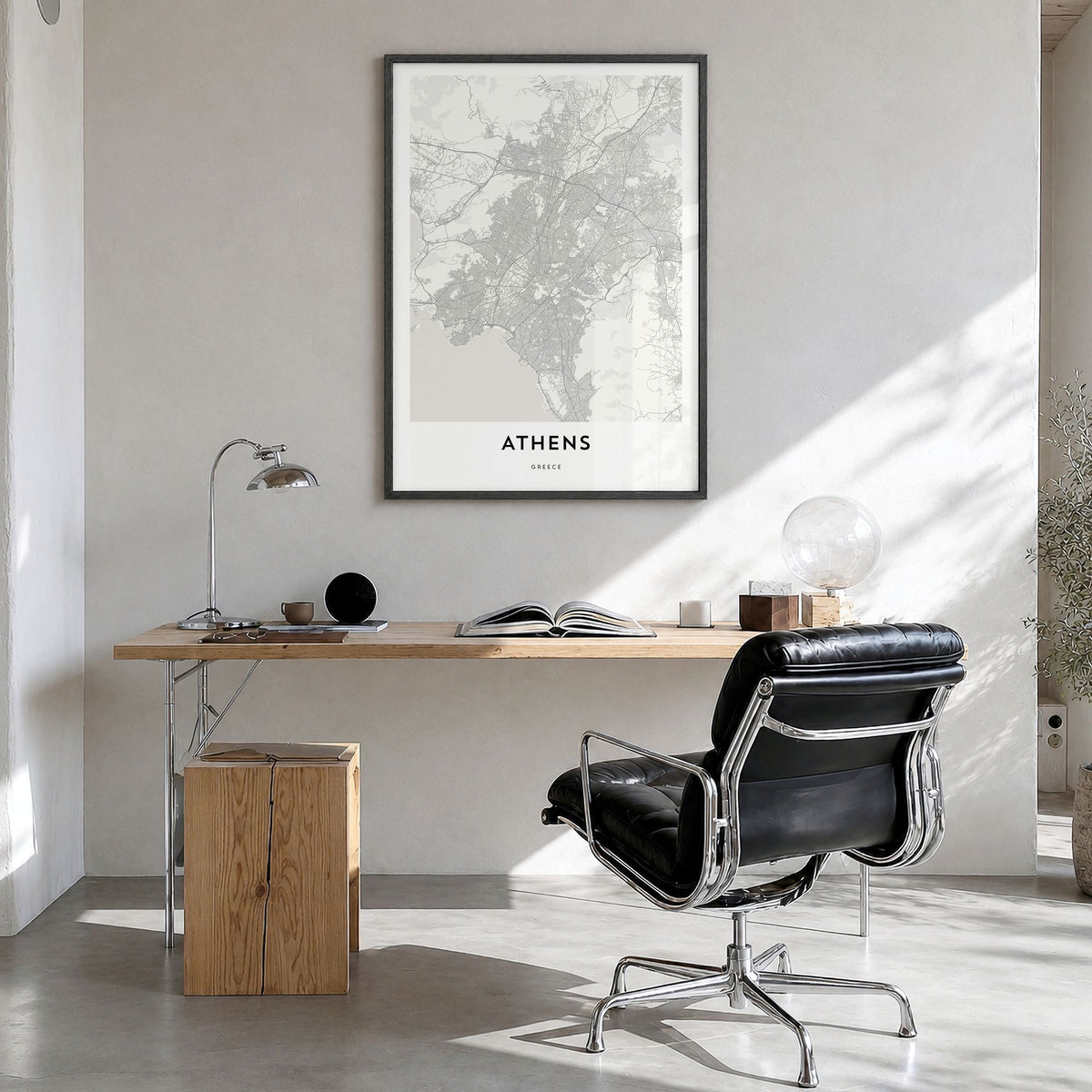 Athens, Greece Map Poster in a black wood frame, hanging in a bright home office
