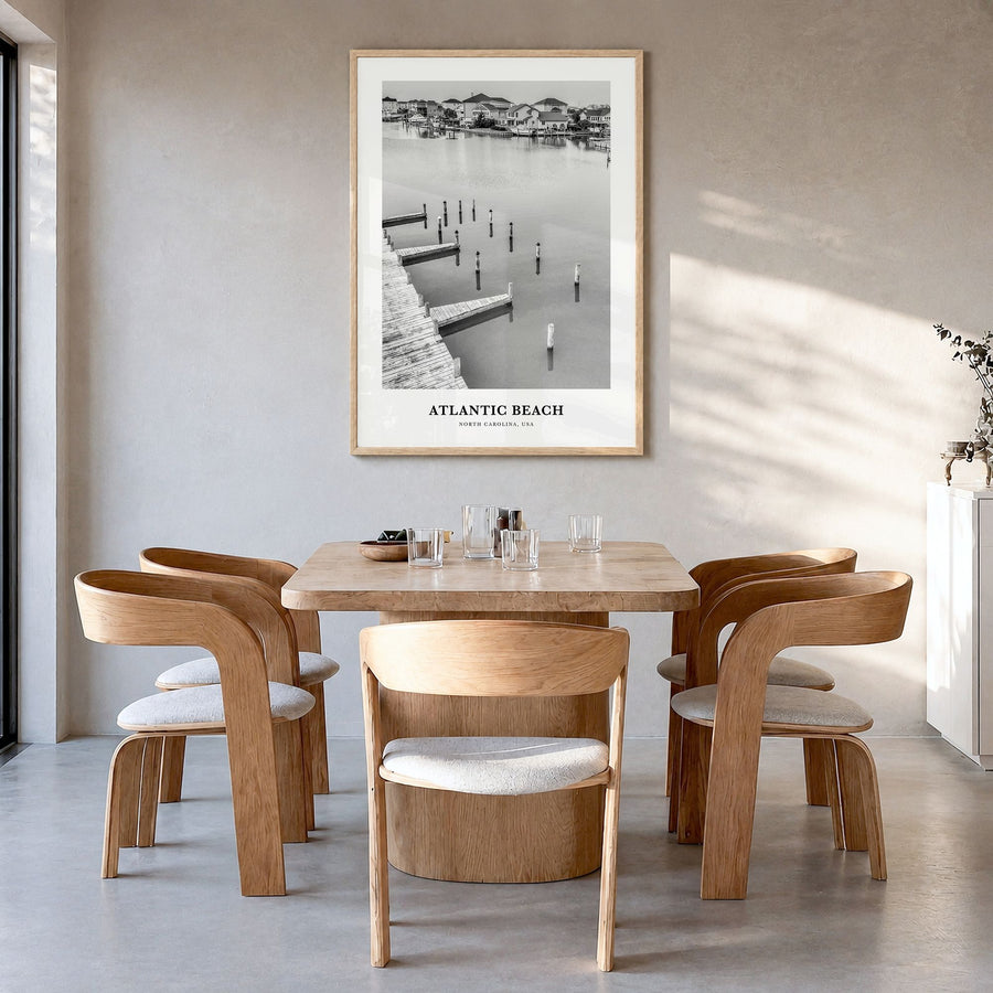 Atlantic Beach Classic Poster in a natural wood frame, hanging in a dining room