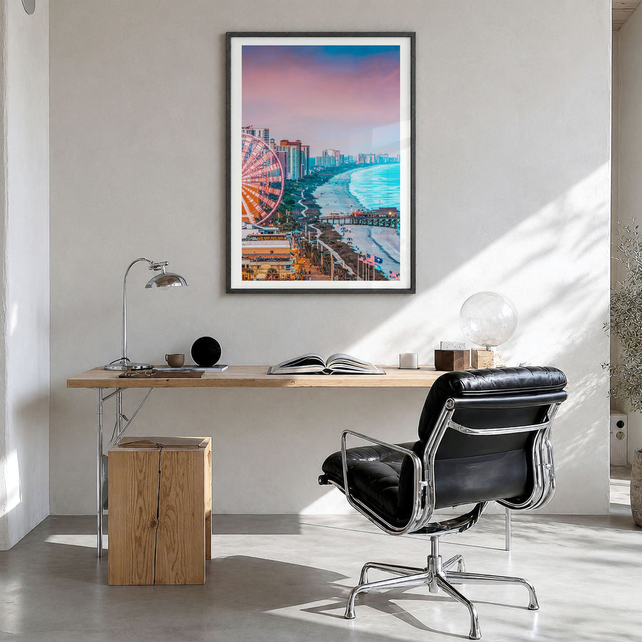 Atlantic City Photo Poster in a black wood frame, hanging in a bright home office, white border