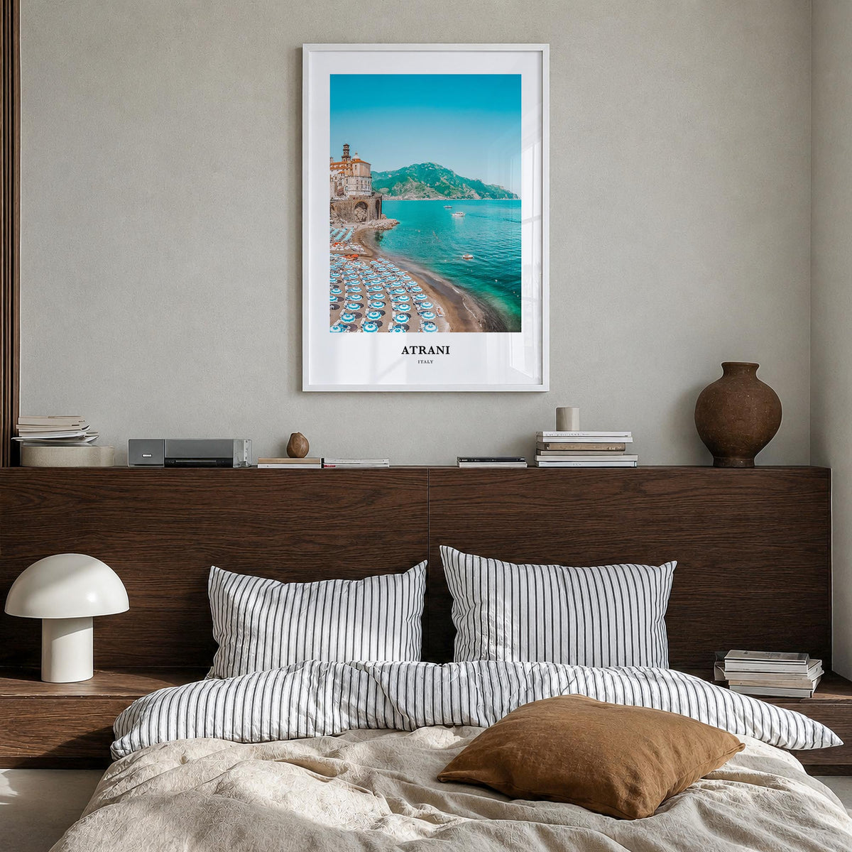 Atrani colorful classic poster of Italy – vertical wall art in white wood frame, hanging on wall