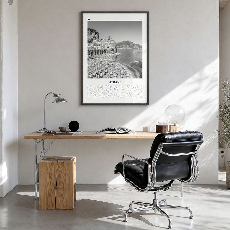 Atrani Newspaper Poster in a black wood frame, hanging in a bright home office