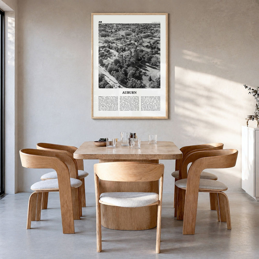Auburn, Alabama Newspaper Poster in a natural wood frame, hanging in a dining room