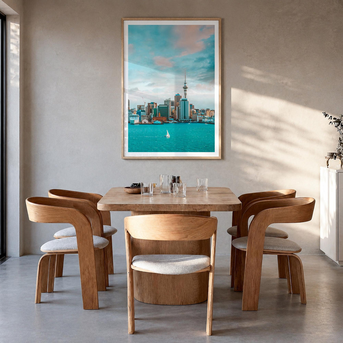 Auckland colorful photo poster of New Zealand – vertical wall art in natural wood frame with white border, hanging on wall