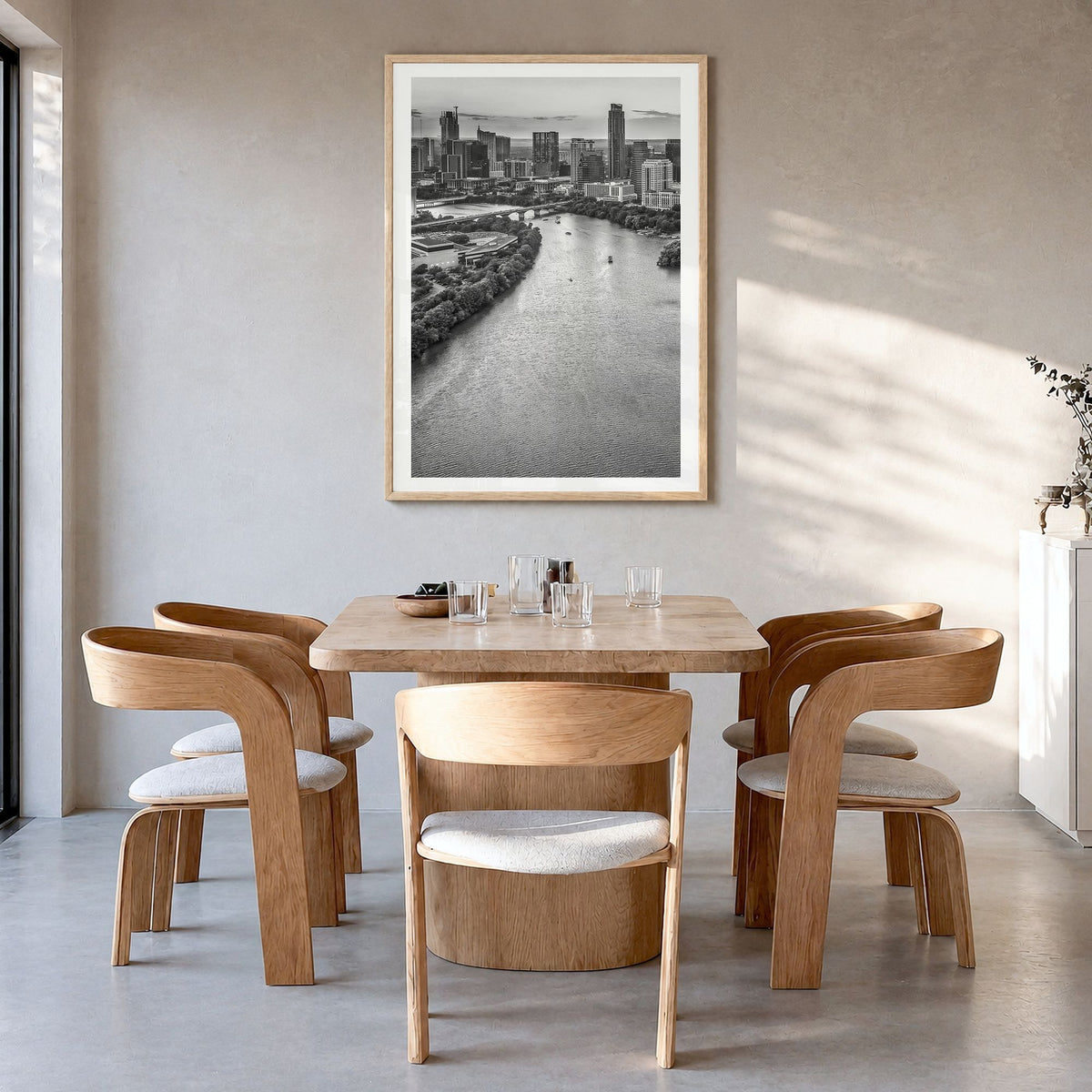 Austin Photo No 1 Poster in a natural wood frame, hanging in a dining room, white border