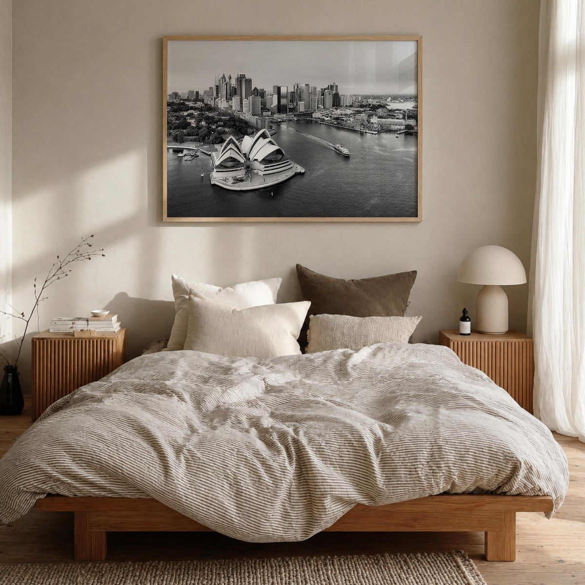 Australia black & white photo poster of Oceania – horizontal wall art in natural wood frame, hanging on wall