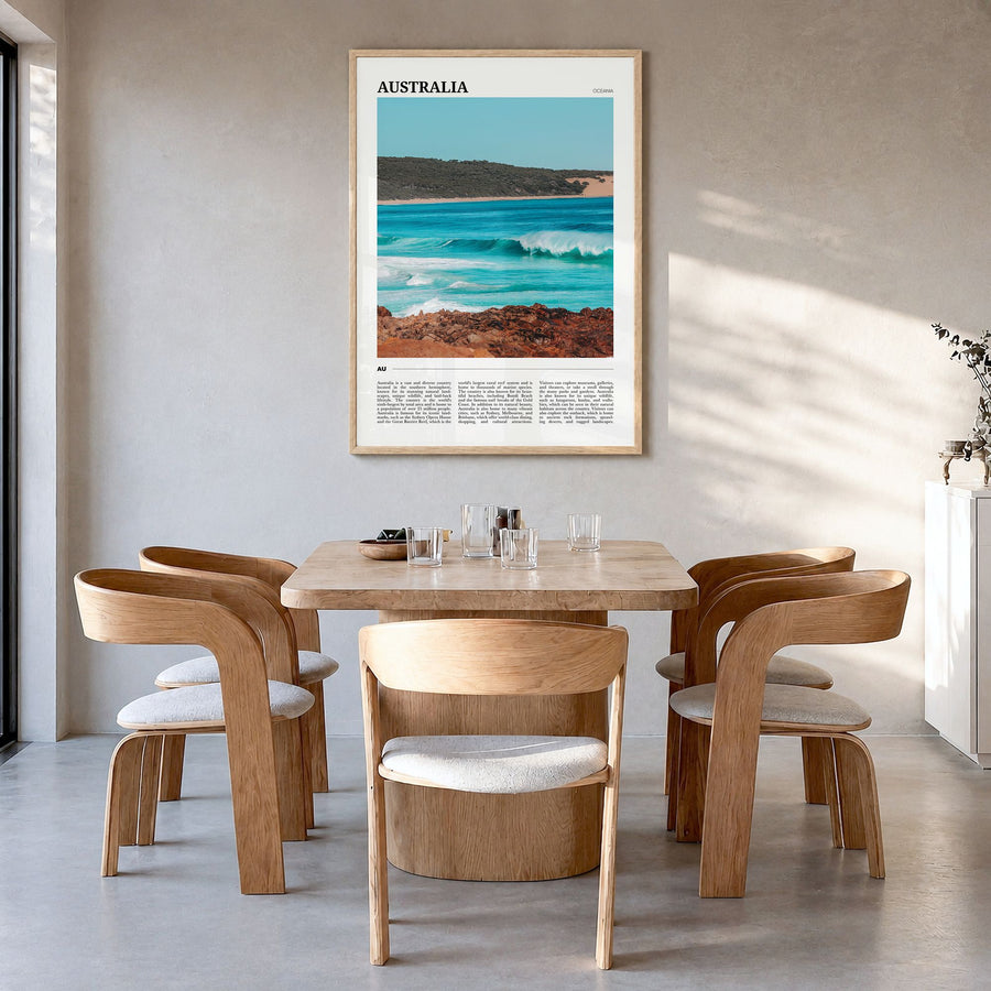 Australia Travel Poster in a natural wood frame, hanging in a dining room
