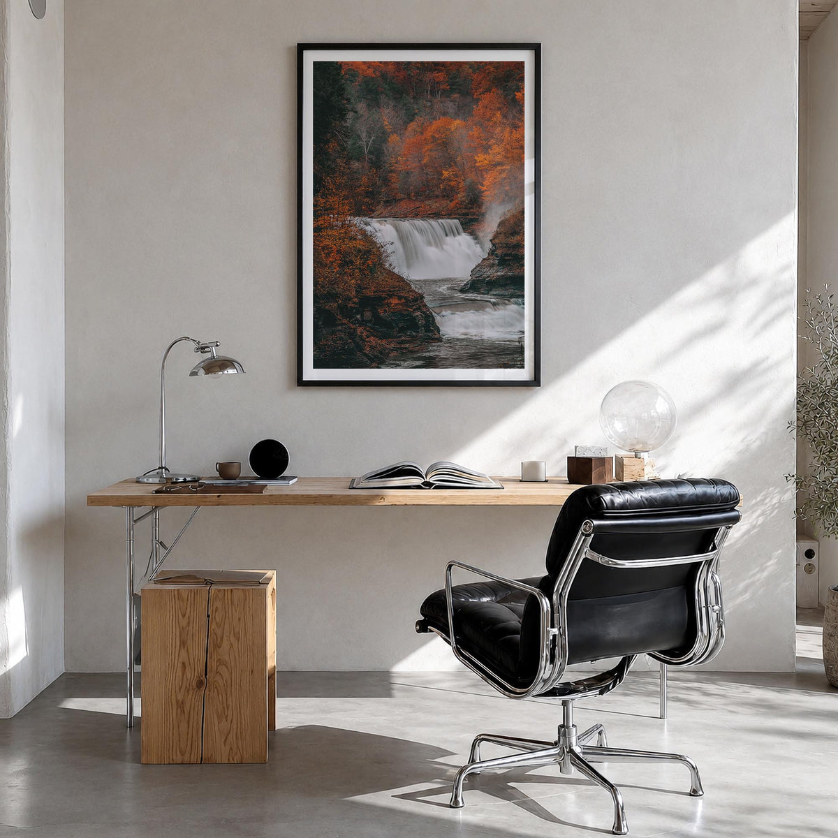 Autumn Waterfall no. 2 colorful photo poster – vertical wall art in black wood frame with white border, hanging on wall