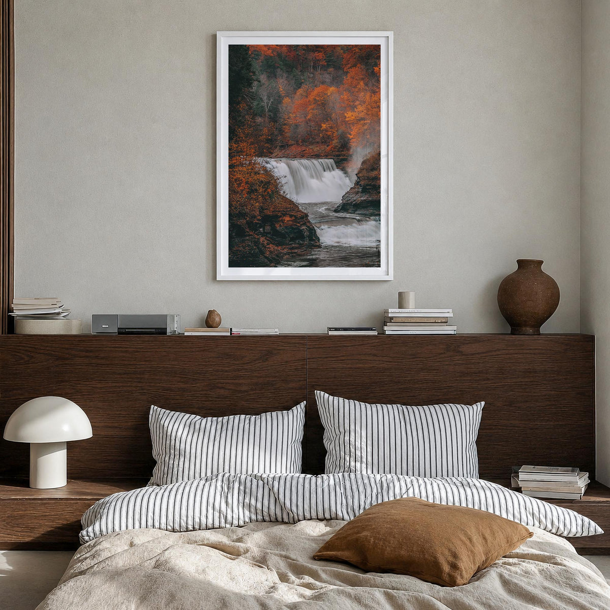 Autumn Waterfall no. 2 colorful photo poster – vertical wall art in white wood frame with white border, hanging on wall