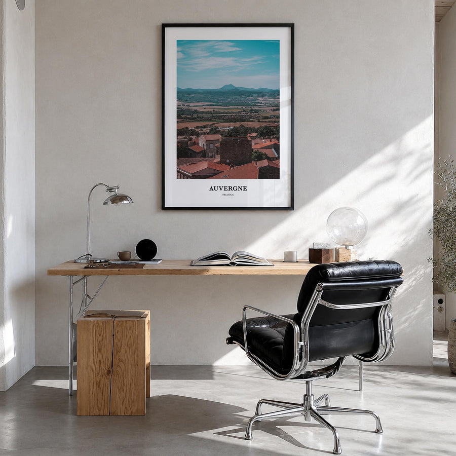 Auvergne colorful classic poster of France – vertical wall art in black wood frame, hanging on wall