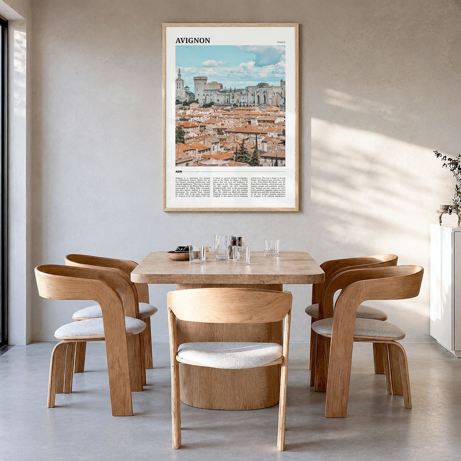 Avignon Travel Poster in a natural wood frame, hanging in a dining room