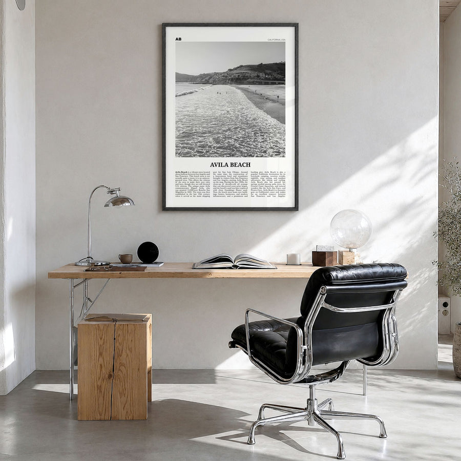 Avila Beach Newspaper No 1 Poster in a black wood frame, hanging in a bright home office