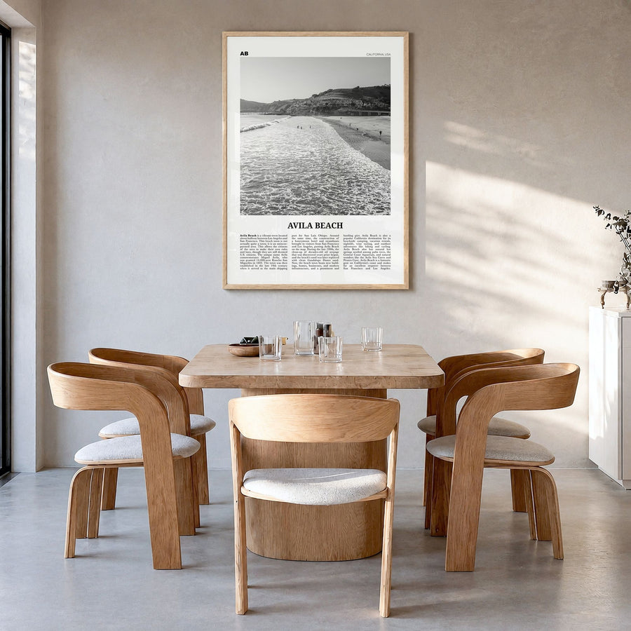 Avila Beach Newspaper No 1 Poster in a natural wood frame, hanging in a dining room