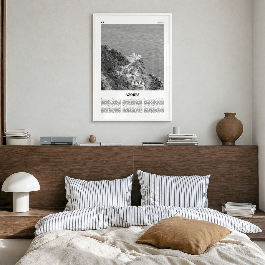 Azores Newspaper Poster in a white wood frame, hanging in a bedroom