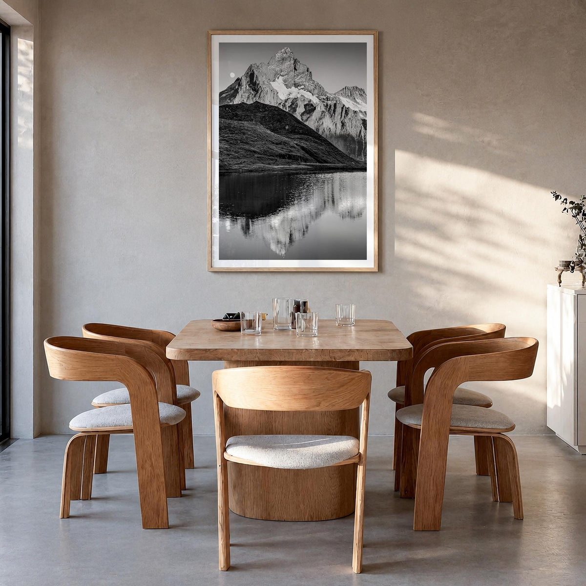 Bachalpsee black & white photo poster of Switzerland – vertical wall art in natural wood frame with white border, hanging on 