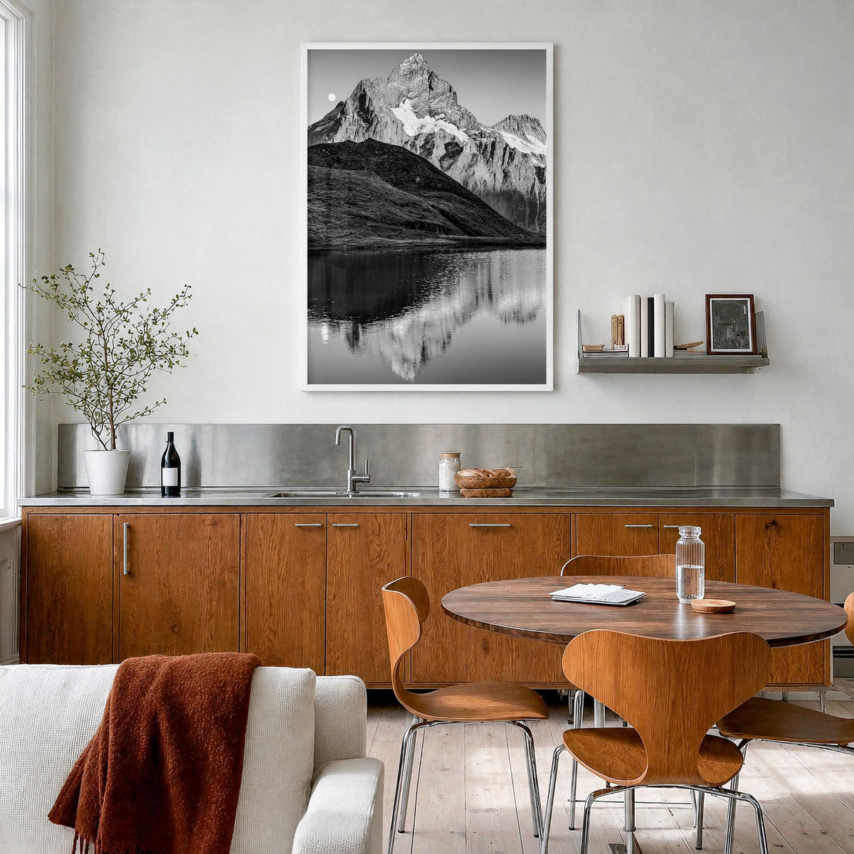 Bachalpsee Photo Poster in a white wood frame, hanging in a kitchen with a dining area, full image (no border)