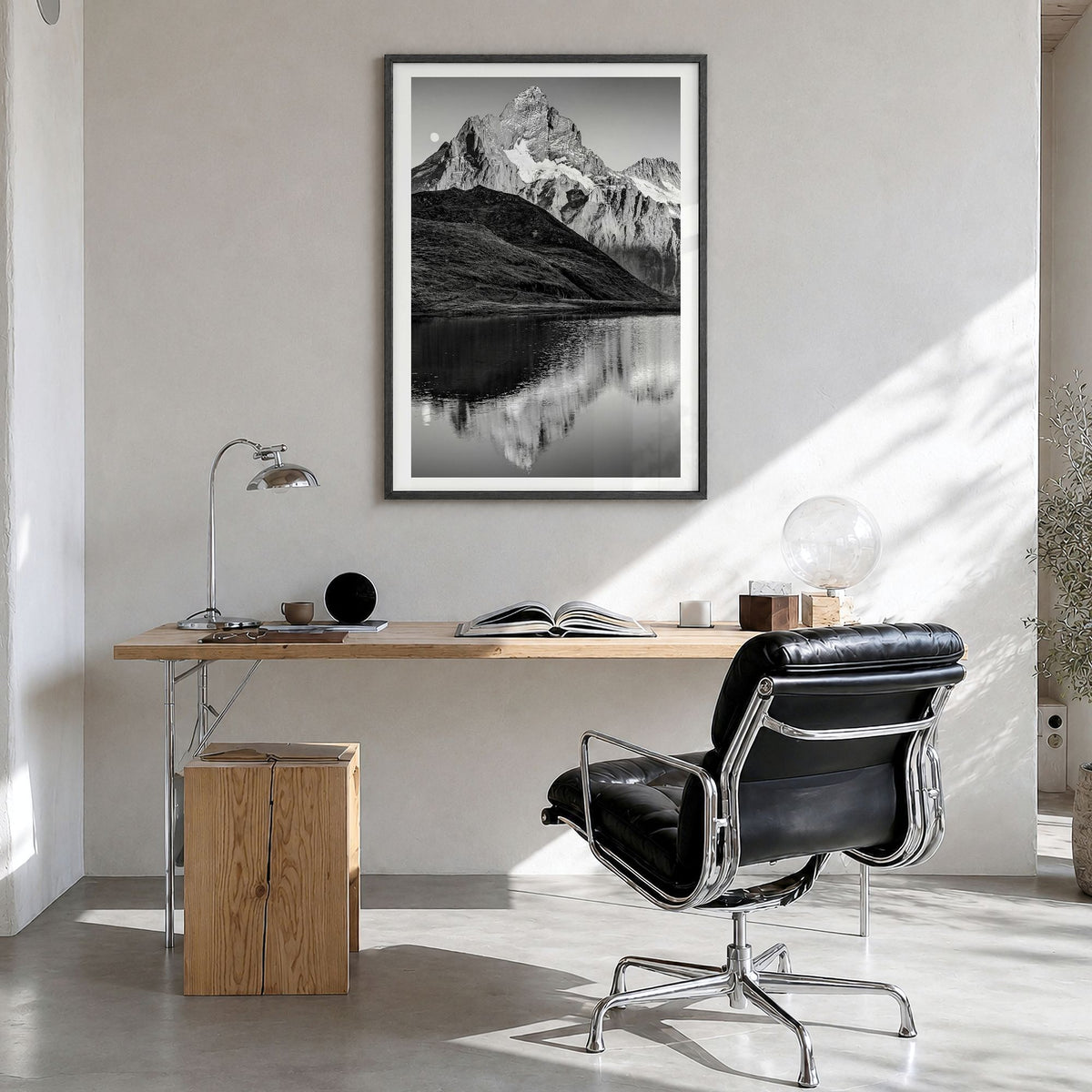 Bachalpsee Photo Poster in a black wood frame, hanging in a bright home office, white border