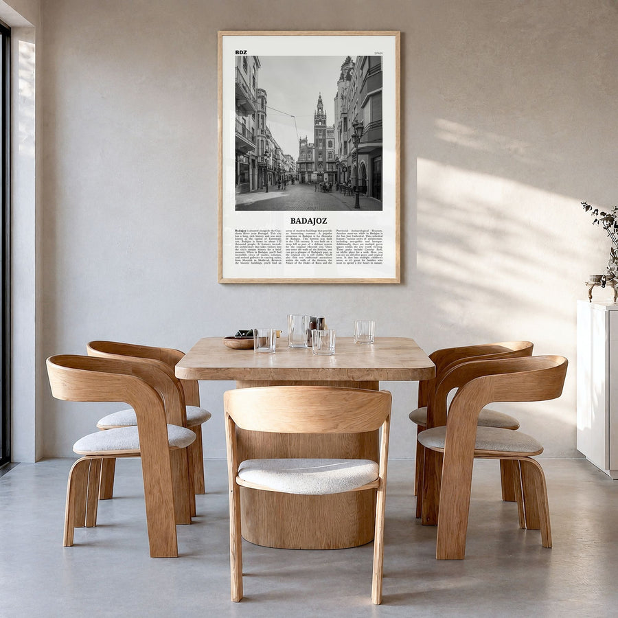 Badajoz Newspaper Poster in a natural wood frame, hanging in a dining room