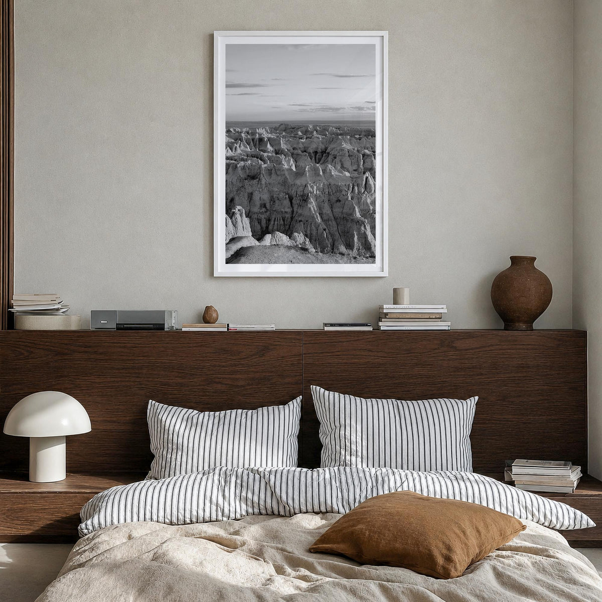 Badlands National Park black & white photo poster of South Dakota, USA – vertical wall art in white wood frame with white bor