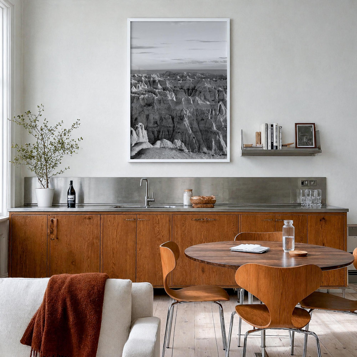 Badlands National Park black & white photo poster of South Dakota, USA – vertical wall art in white wood frame, hanging on wa