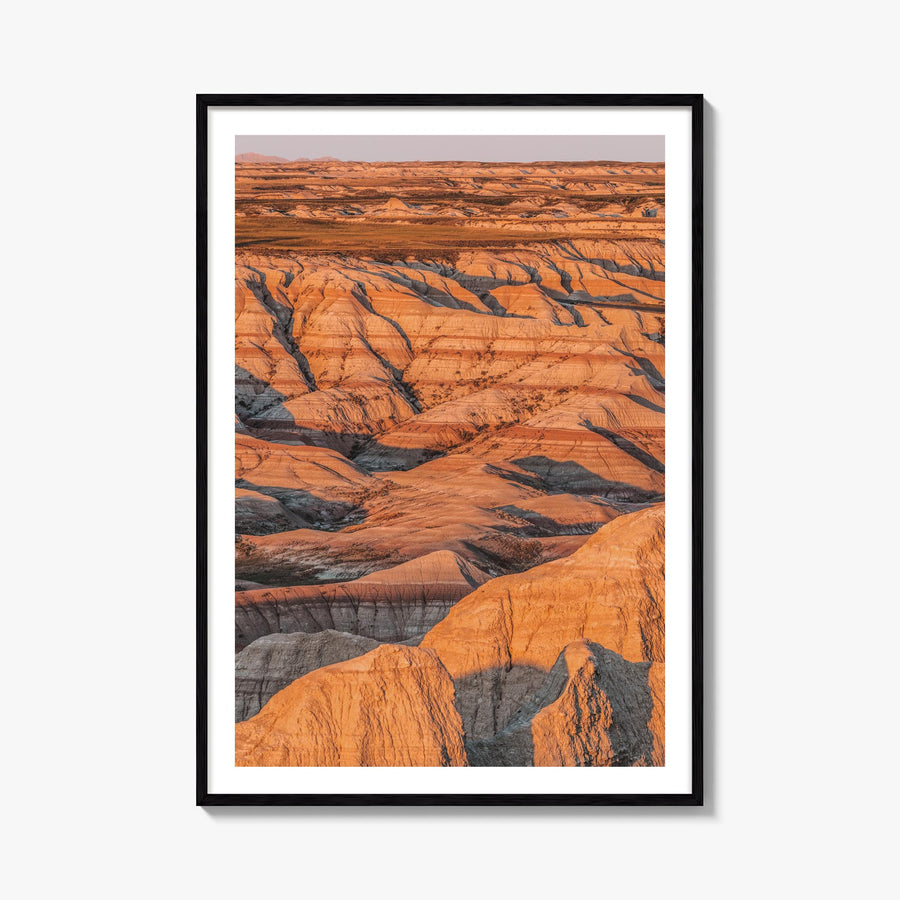 Badlands National Park colorful photo poster of South Dakota, USA – vertical wall art, unframed print shown in interior mocku