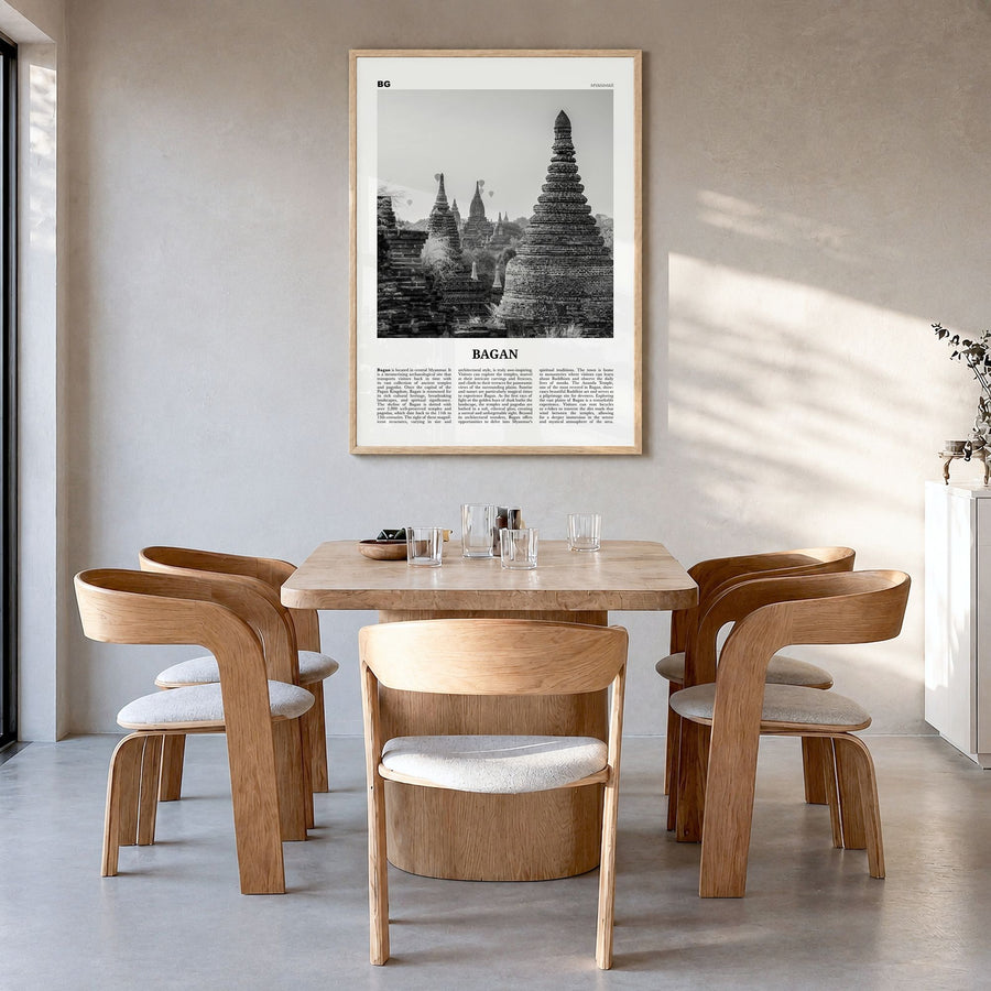 Bagan Newspaper Poster in a natural wood frame, hanging in a dining room