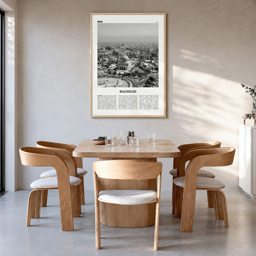 Baghdad Newspaper Poster in a natural wood frame, hanging in a dining room
