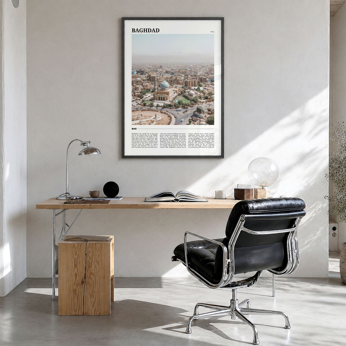 Baghdad Travel No 1 Poster in a black wood frame, hanging in a bright home office