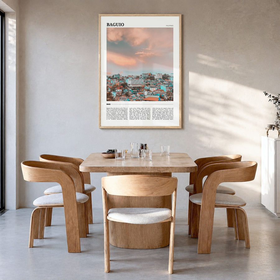 Baguio Travel Poster in a natural wood frame, hanging in a dining room