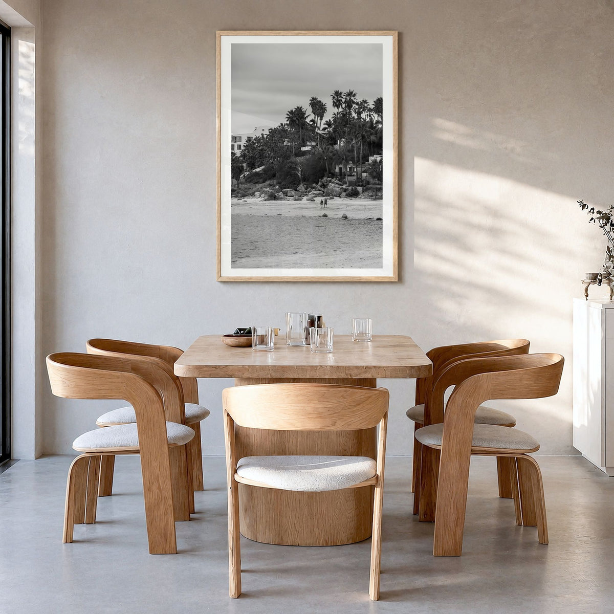 Baja California Sur Photo Poster in a natural wood frame, hanging in a dining room, white border