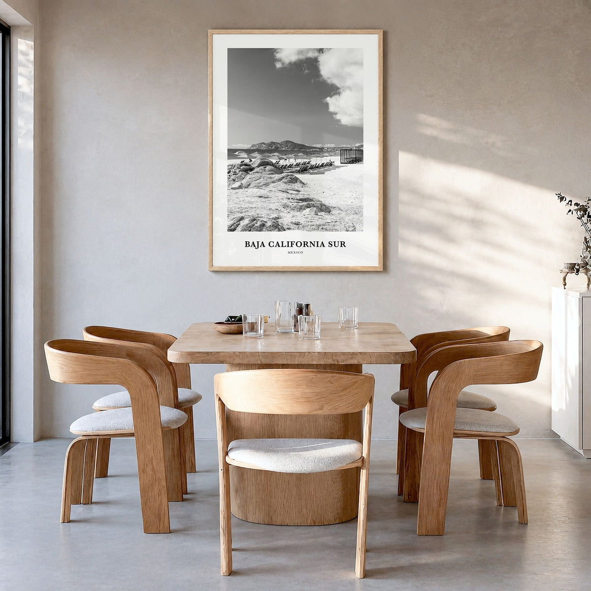 Baja California Sur Classic Poster in a natural wood frame, hanging in a dining room