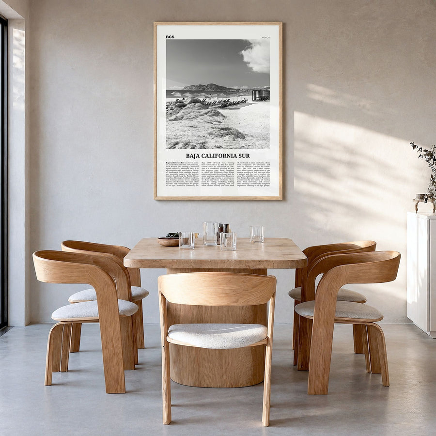 Baja California Sur Newspaper Poster in a natural wood frame, hanging in a dining room