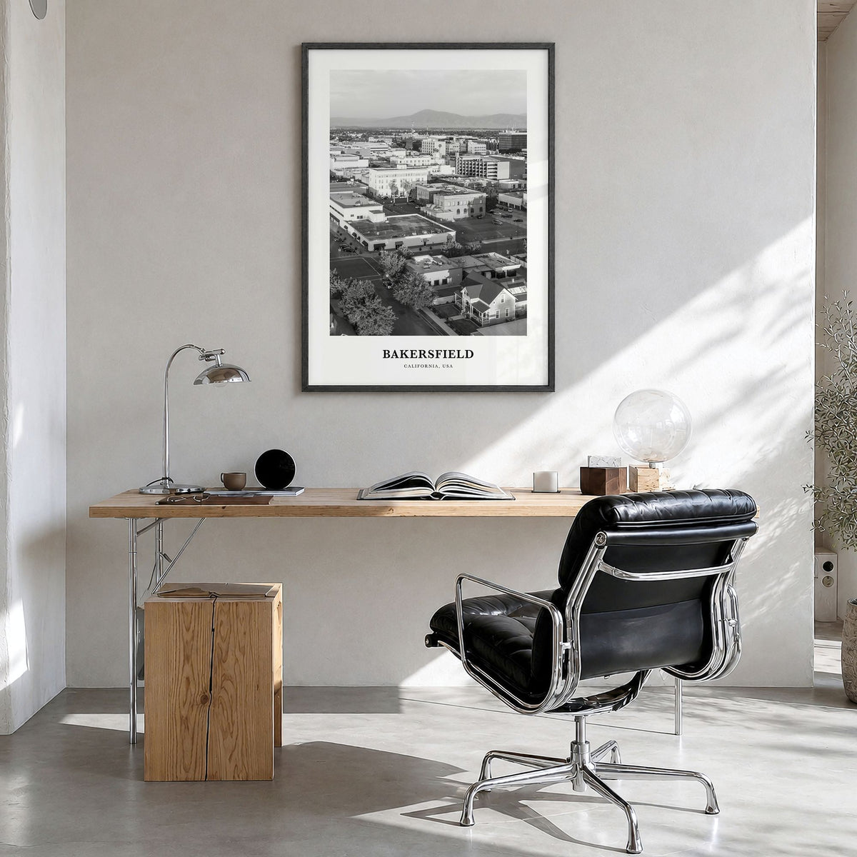 Bakersfield Classic Poster in a black wood frame, hanging in a bright home office