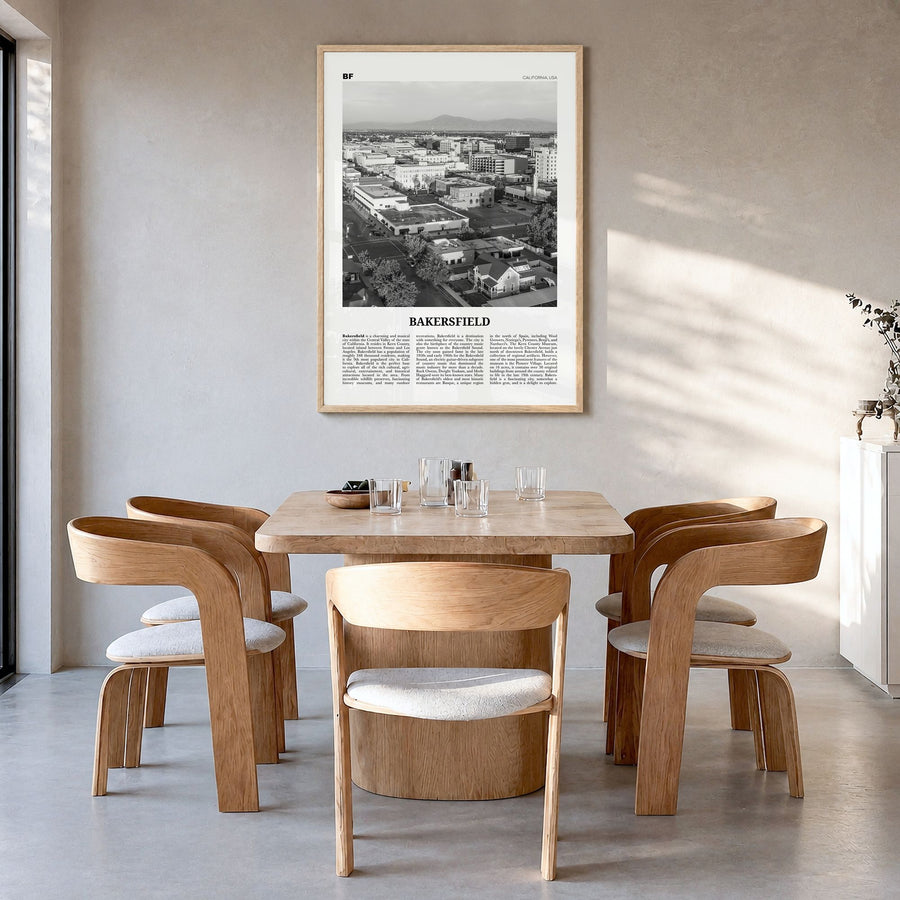 Bakersfield Newspaper Poster in a natural wood frame, hanging in a dining room