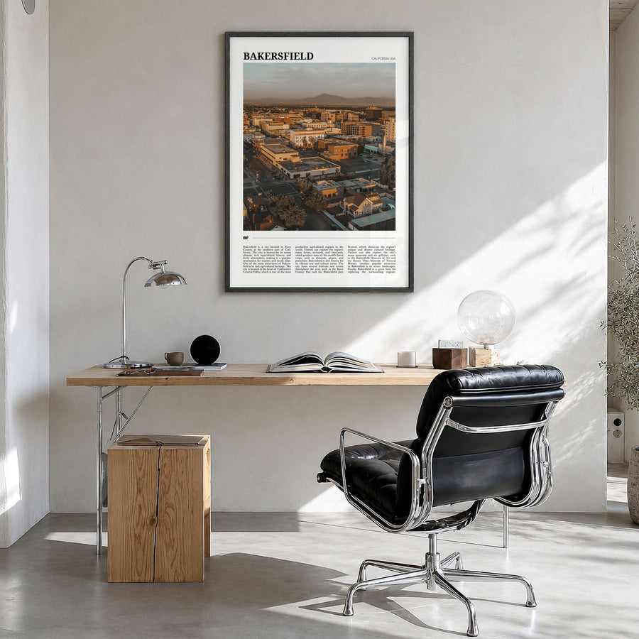 Bakersfield Travel Poster in a black wood frame, hanging in a bright home office