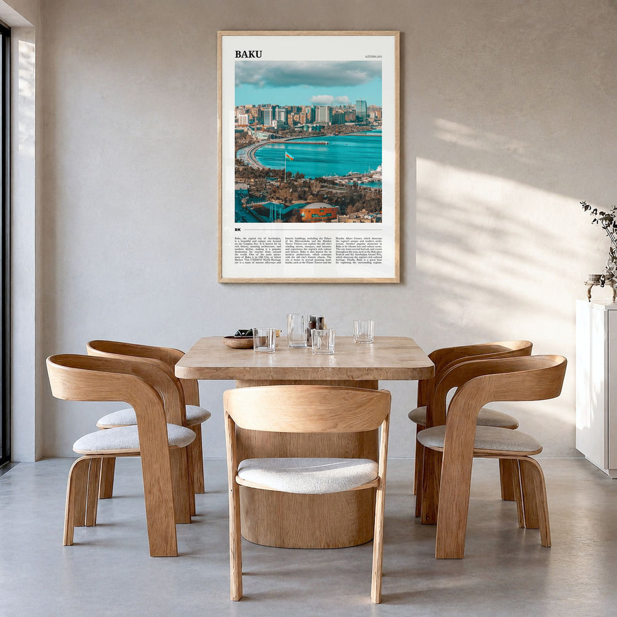 Baku Travel Poster in a natural wood frame, hanging in a dining room
