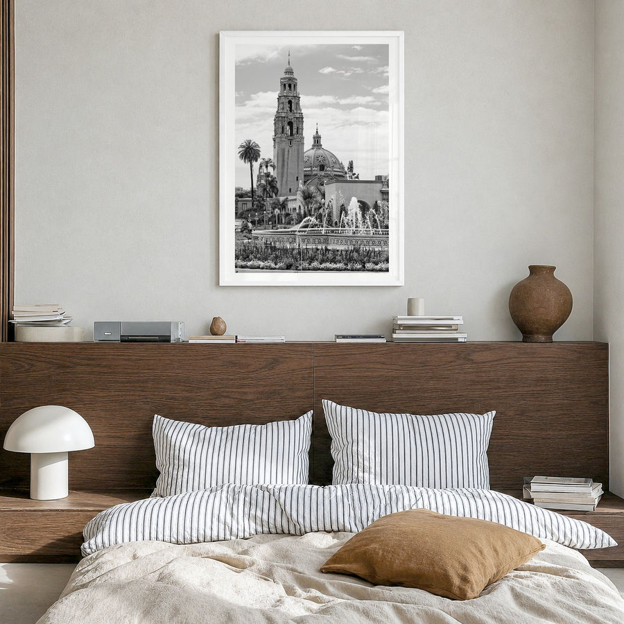 Balboa Park Photo Poster in a white wood frame, hanging in a bedroom, white border