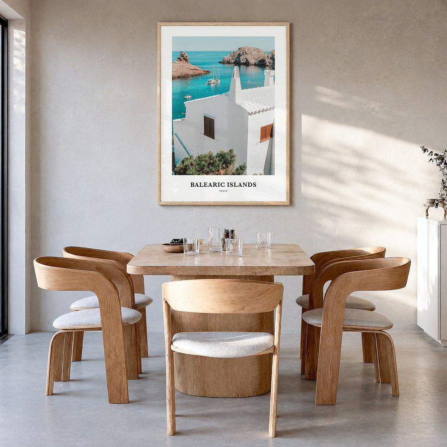 Balearic Islands Classic Poster in a natural wood frame, hanging in a dining room