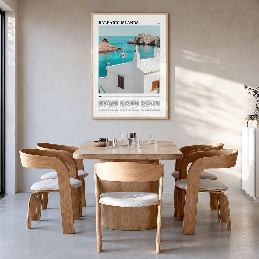 Balearic Islands Travel Poster in a natural wood frame, hanging in a dining room