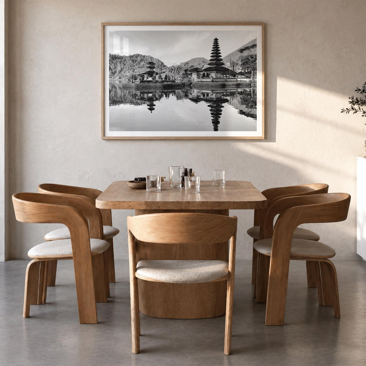 Bali black & white photo poster of Indonesia – horizontal wall art in natural wood frame with white border, hanging on wall