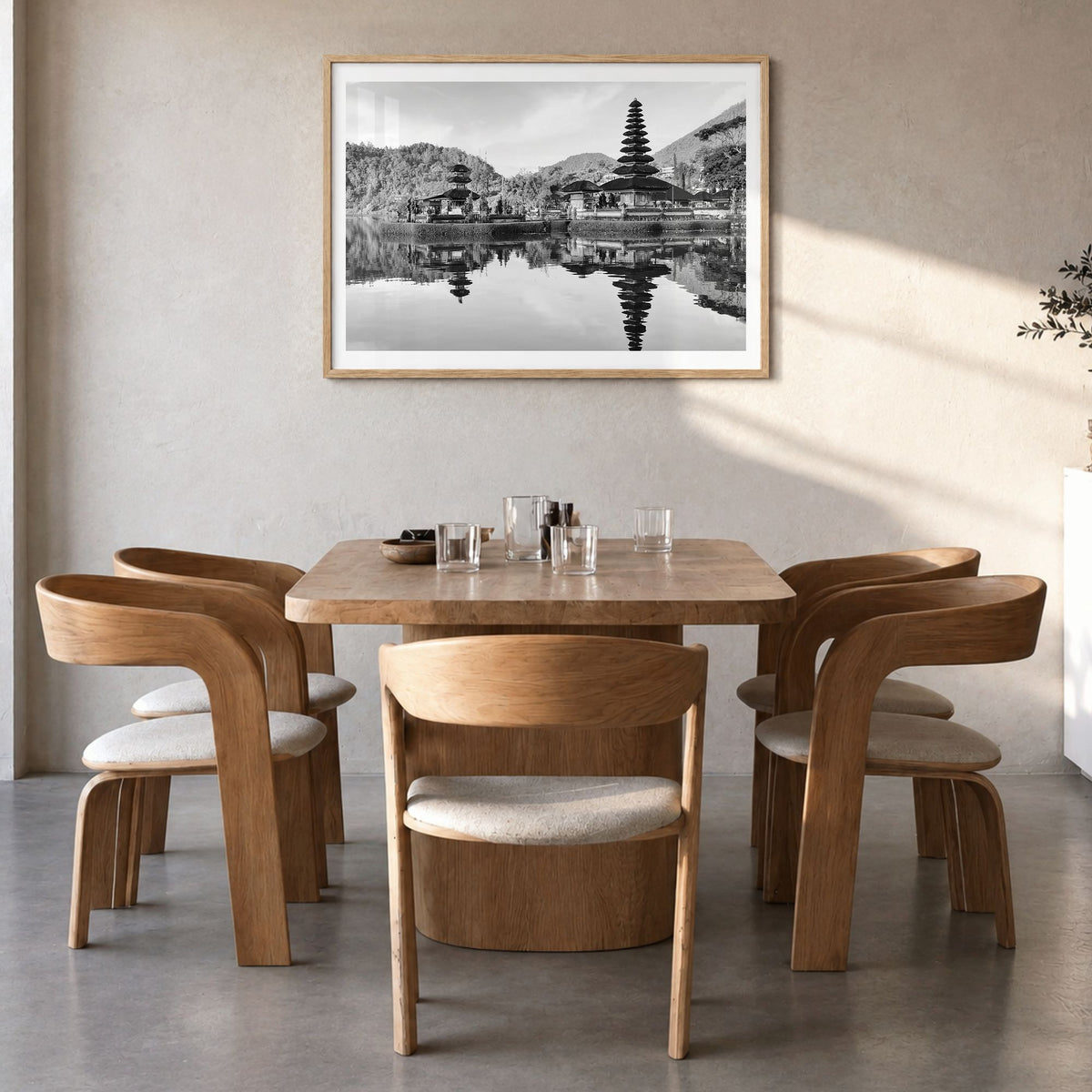 Bali Photo Poster in a natural wood frame, hanging in a dining room, white border