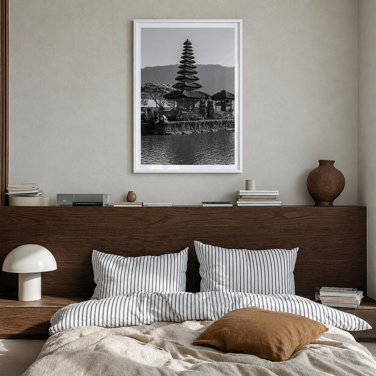 Bali no. 1 black & white photo poster of Indonesia – vertical wall art in white wood frame with white border, hanging on wall