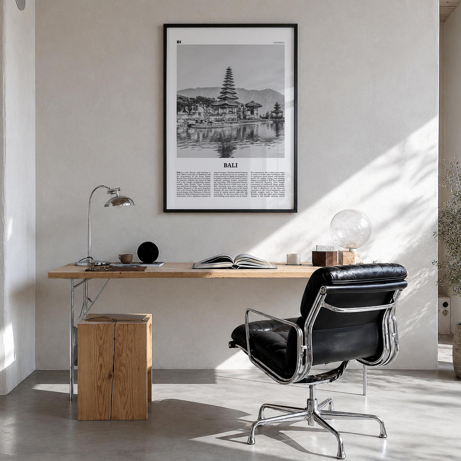 Bali no. 2 black & white newspaper poster of Indonesia – vertical wall art in black wood frame, hanging on wall