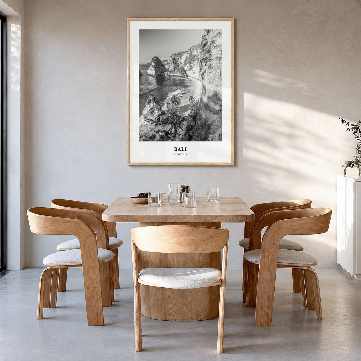 Bali Classic No 1 Poster in a natural wood frame, hanging in a dining room