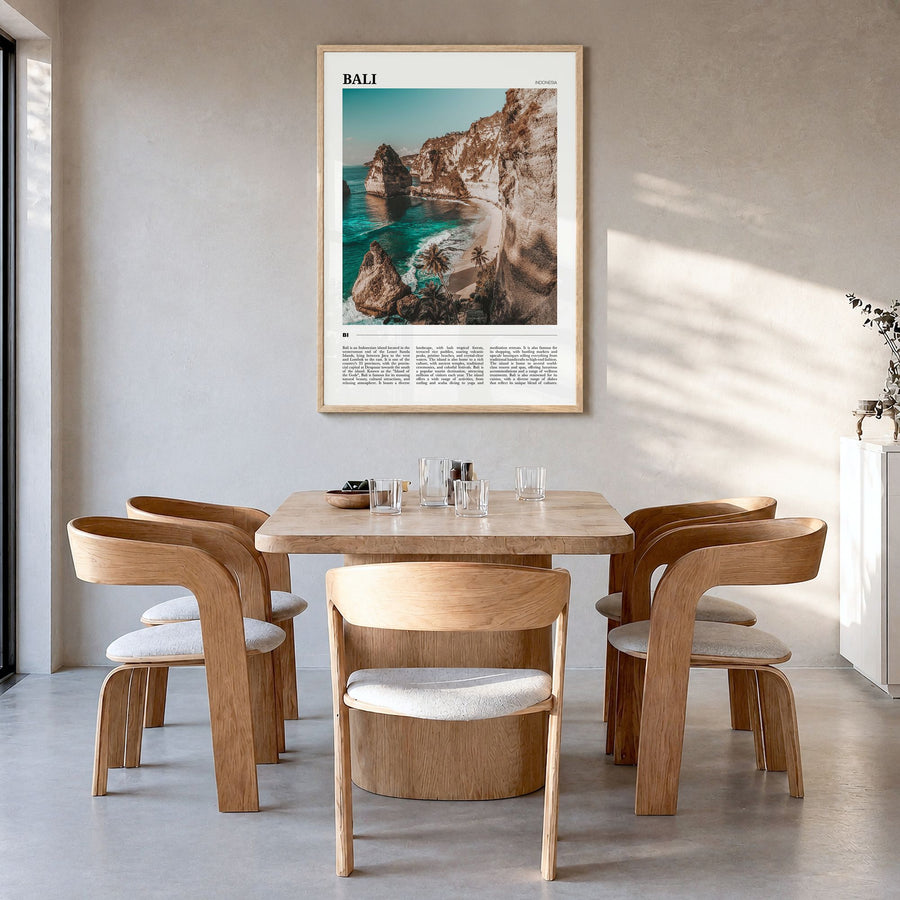 Bali Travel Poster in a natural wood frame, hanging in a dining room